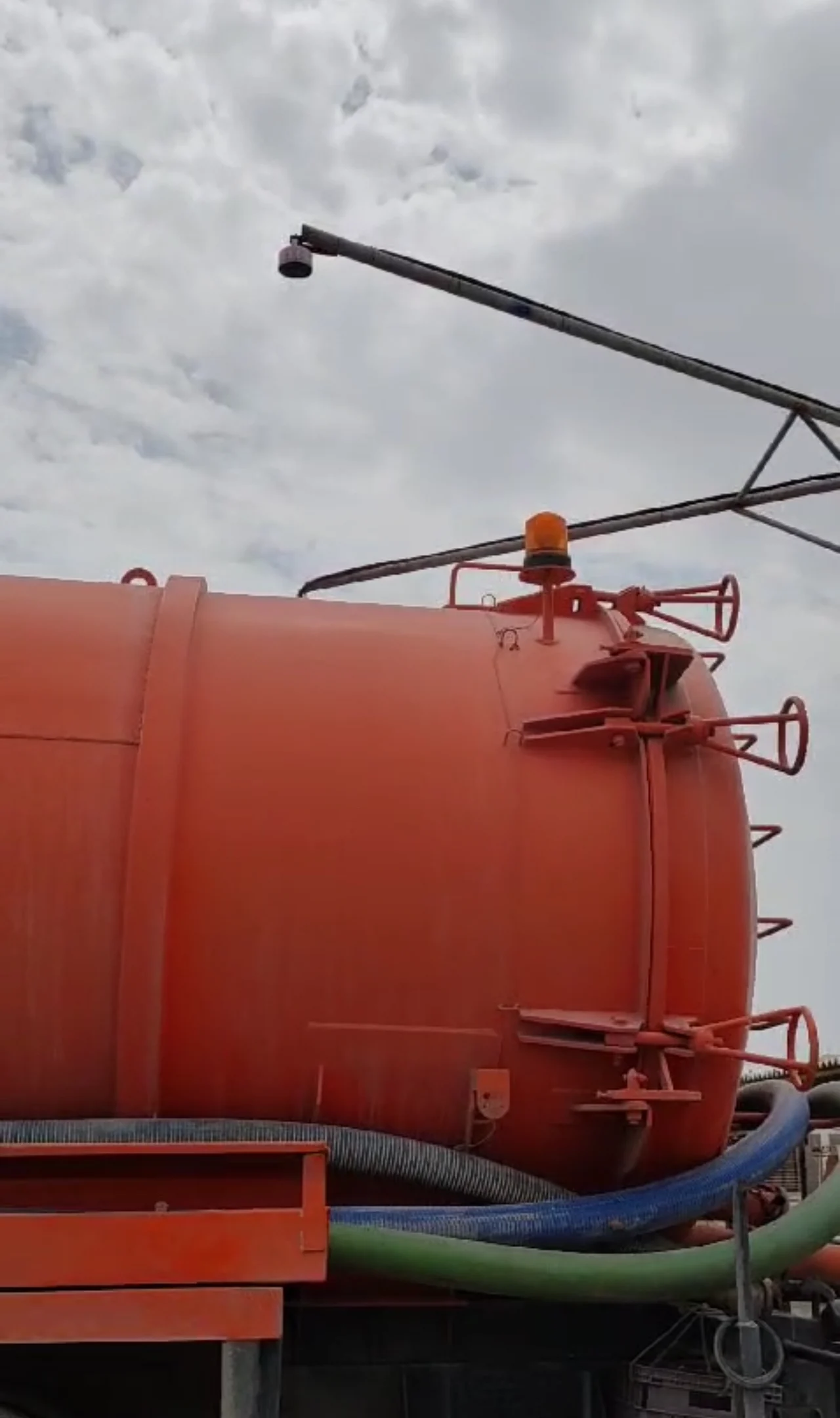 Overhead sensing devices above a tanker parking position
