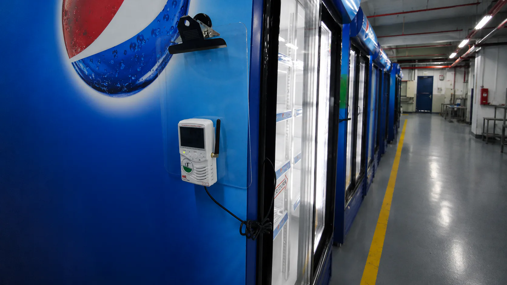 Wireless Temperature Validation for Beverage Fridge Maintenance in Saudi Arabia — on-site photo 2